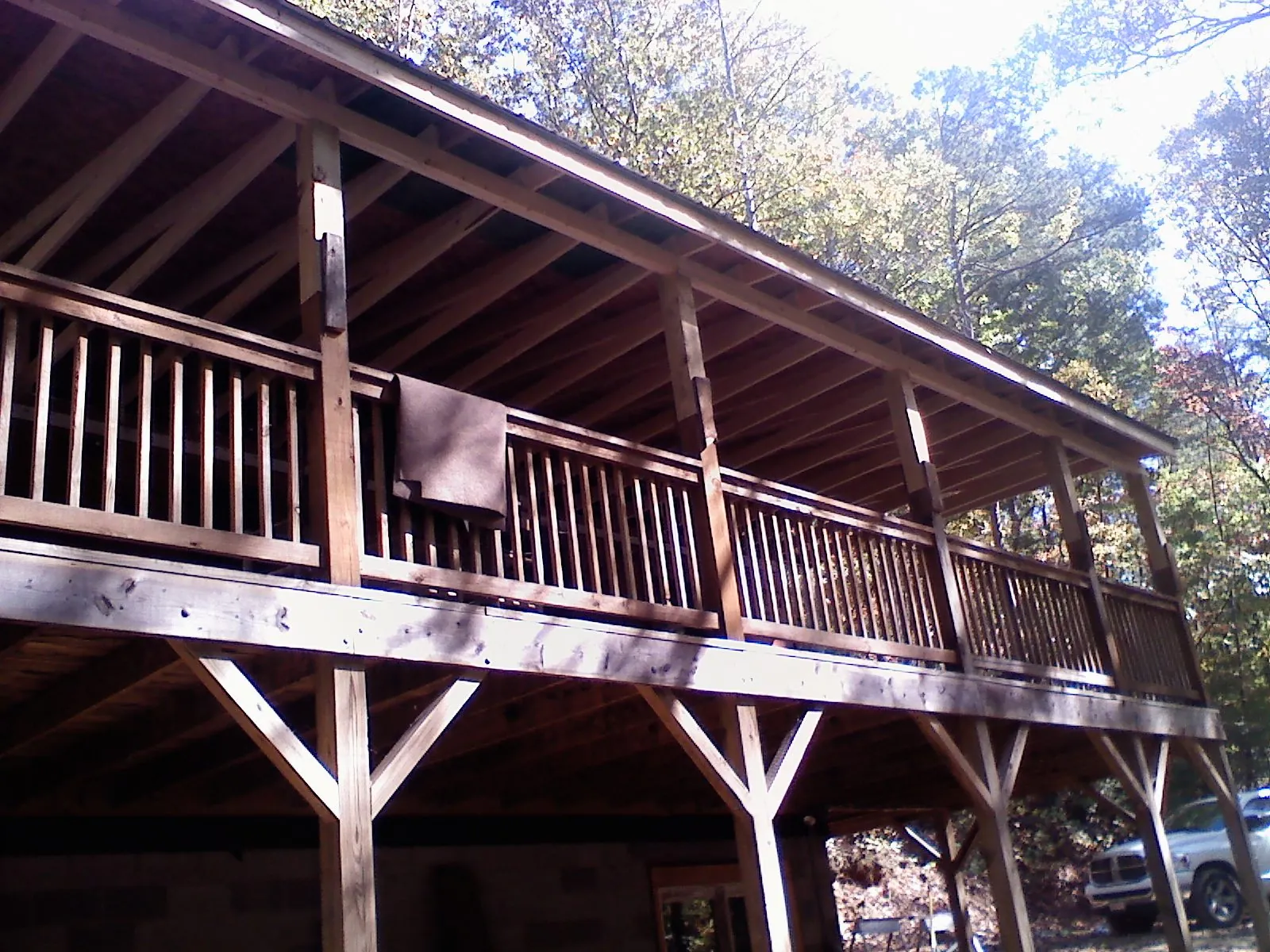 Timber framing under a new elevated porch and deck — Roof Leak Repair in Grays River by Roofing Brothers